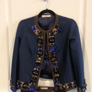 Blazer and Skirt by Prada.